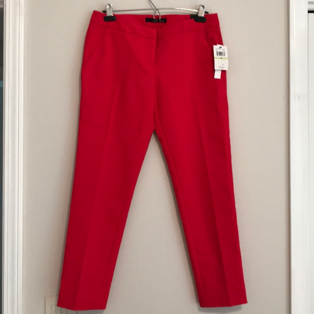 Brand new elegant ankle length pants in red.
